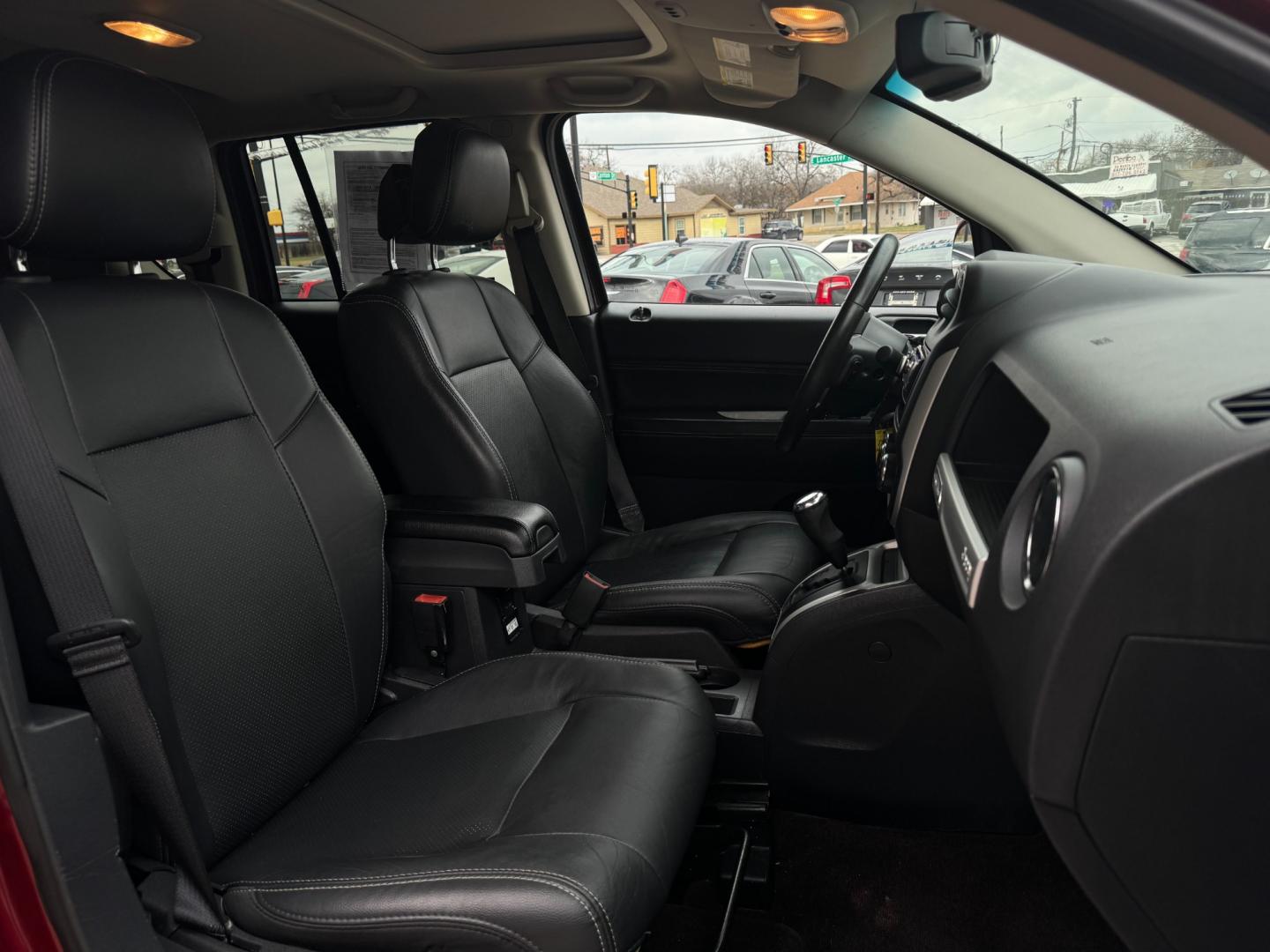 2014 RED /Black JEEP COMPASS LATITUDE Latitude 4dr SUV (1C4NJCEA3ED) with an 2.0L I4 engine, CVT transmission, located at 5900 E. Lancaster Ave., Fort Worth, TX, 76112, (817) 457-5456, 0.000000, 0.000000 - This is a 2014 JEEP COMPASS Latitude 4 DR SUV that is in excellent condition. The interior is clean with no rips or tears or stains. All power windows, door locks and seats. Ice cold AC for those hot Texas summer days. It is equipped with an AM/FM radio, AUX port, Bluetooth connectivity and Sirius X - Photo#16